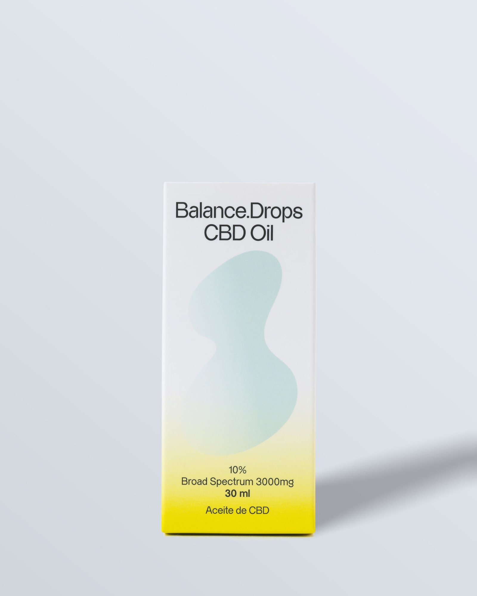 Imagen frontal de la caja del 'Balance Drops Oil' con un diseño en tonos amarillos y verdes, que indica 3000 mg de espectro amplio.