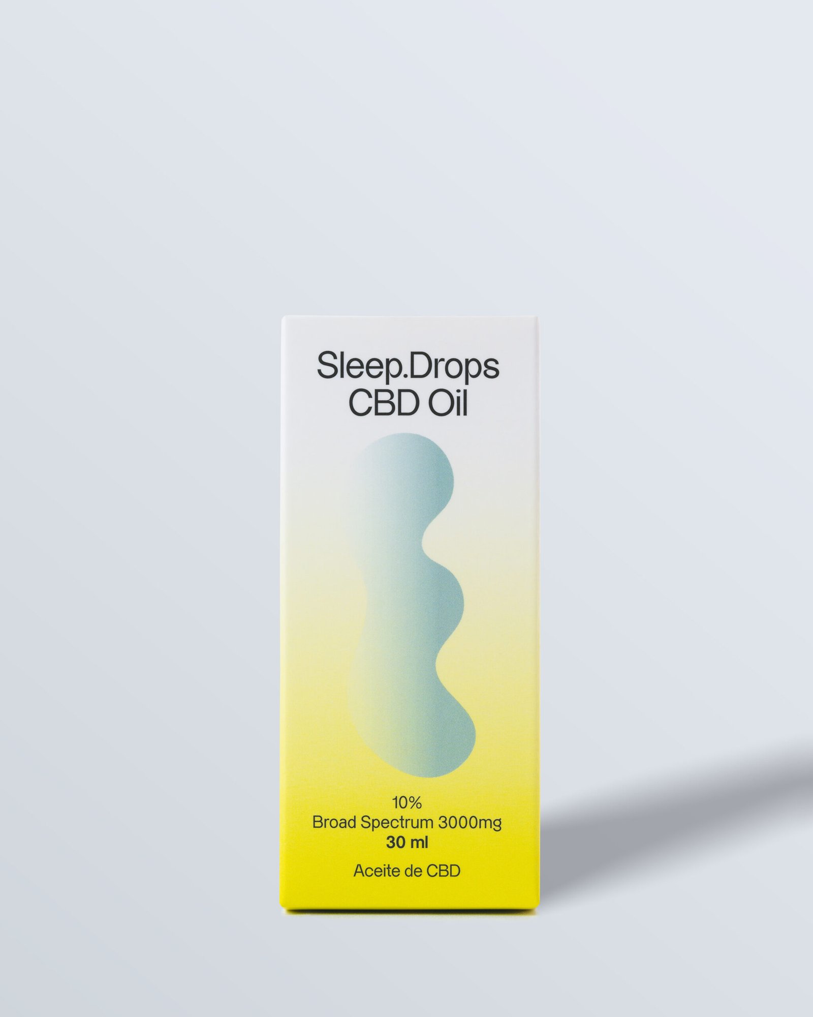 Imagen frontal de la caja de gotas para dormir 'Sleep Drops Oil' con tonos amarillos y verdes, que indica 3000 mg de espectro amplio.