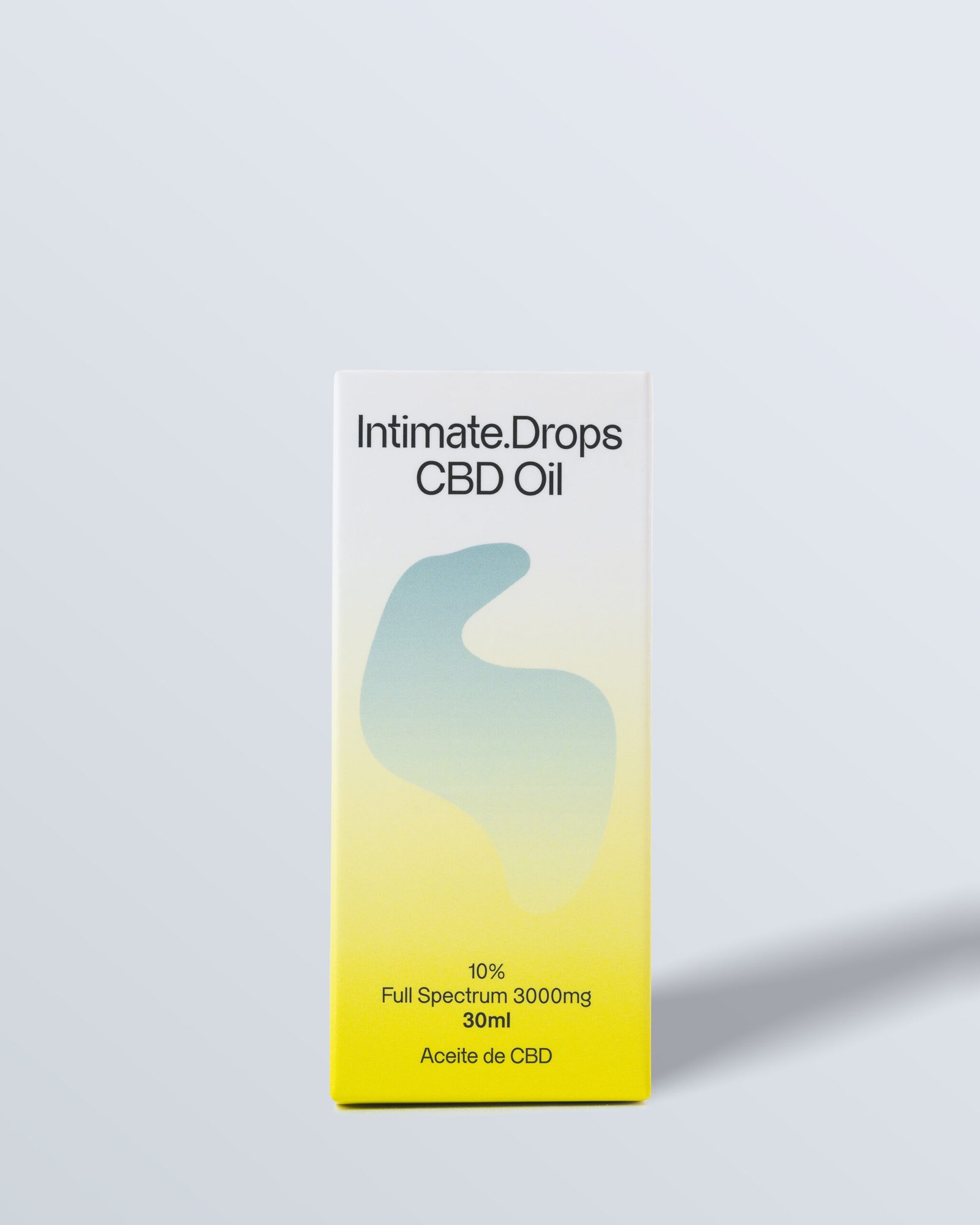 Frontal de la caja del 'Intimate.Drops Oil' en tonos amarillos y verdes.